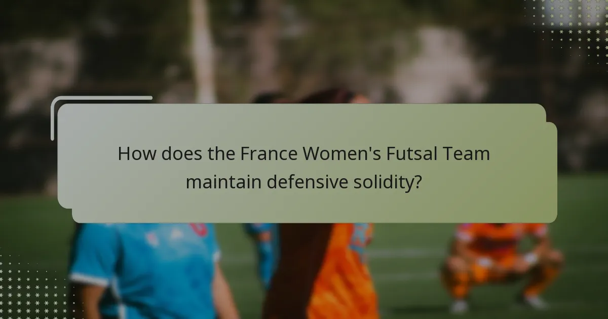 How does the France Women's Futsal Team maintain defensive solidity?